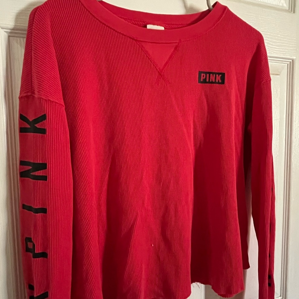 Pink long sleeve runs big fits size L/XL